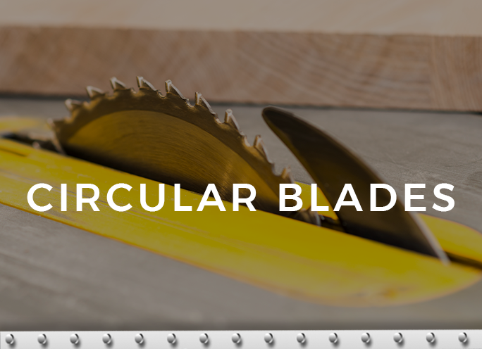 Circular saw blade on woodworking table.